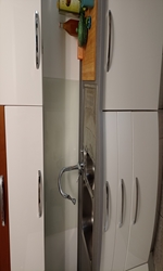 Arredamento: paraschizzi fondo/cucina.
